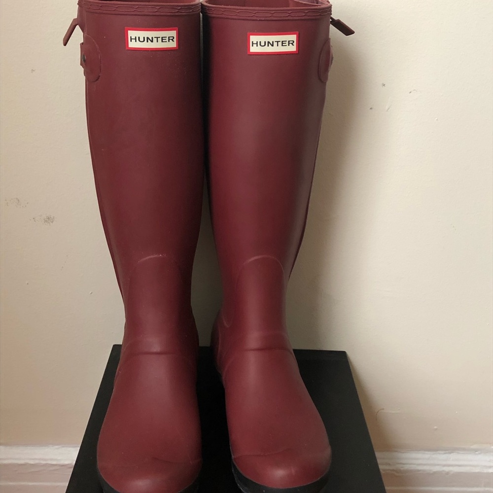 Slim fit hunter boots. Minor tear and wear